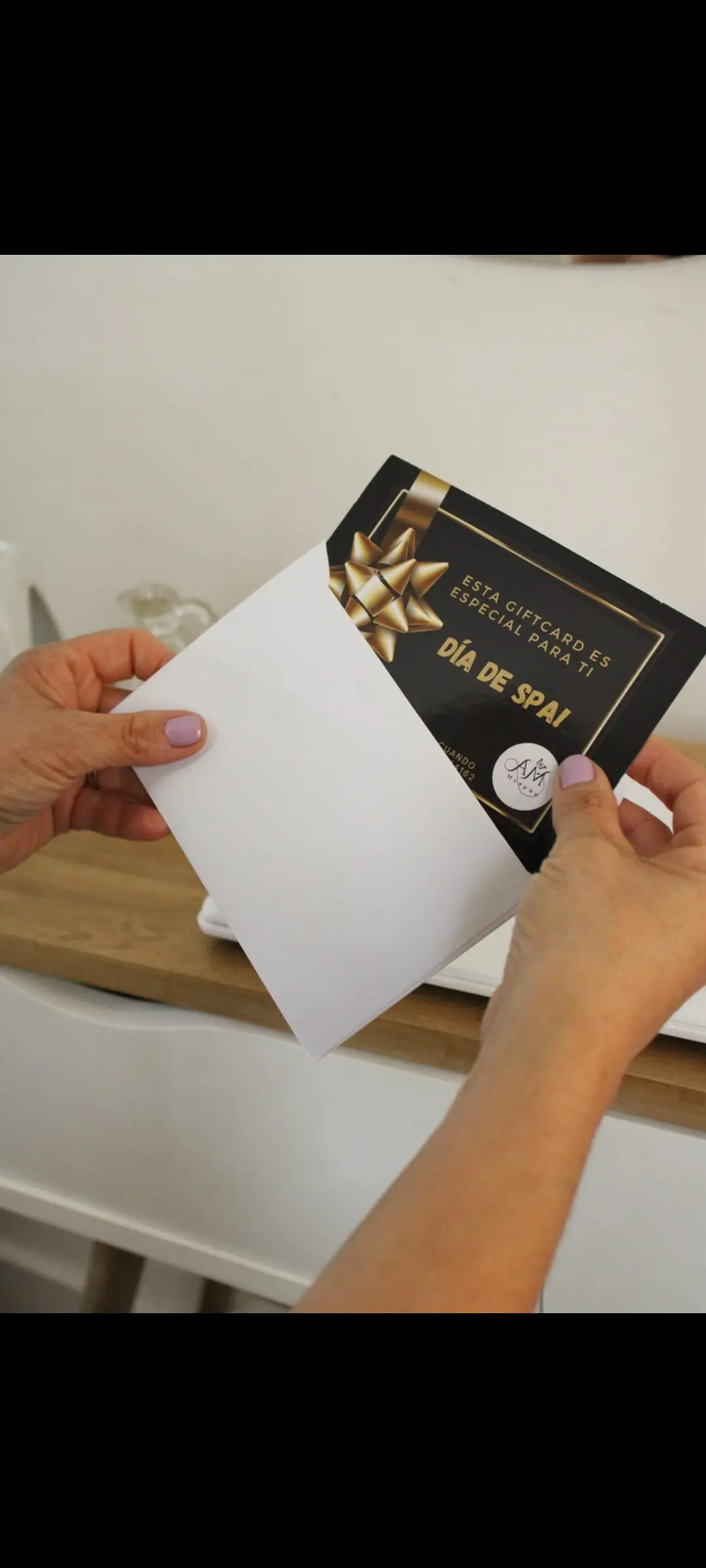 Elegant gift box with ribbon in soft neutral tones