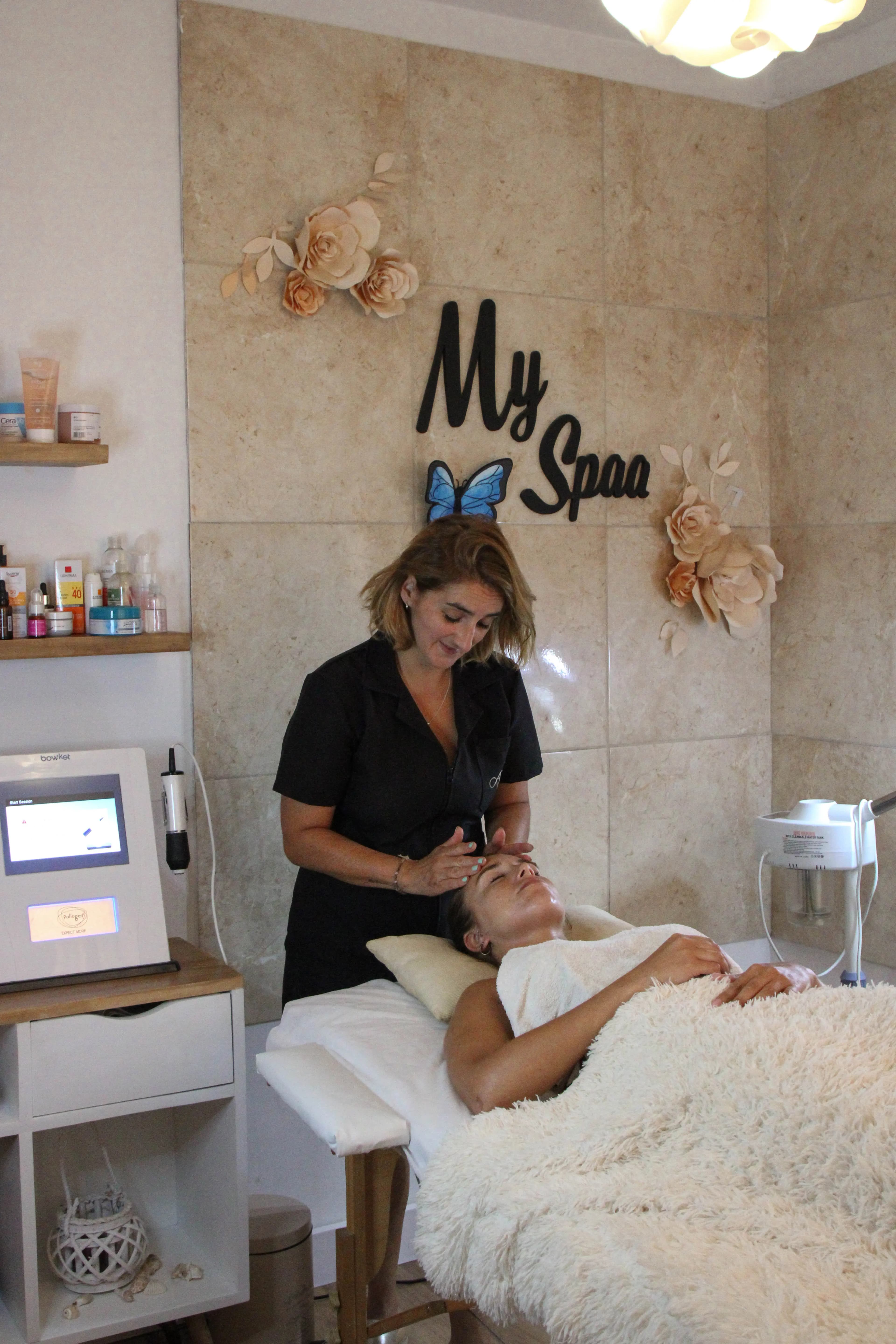 Serene spa treatment room with soft lighting